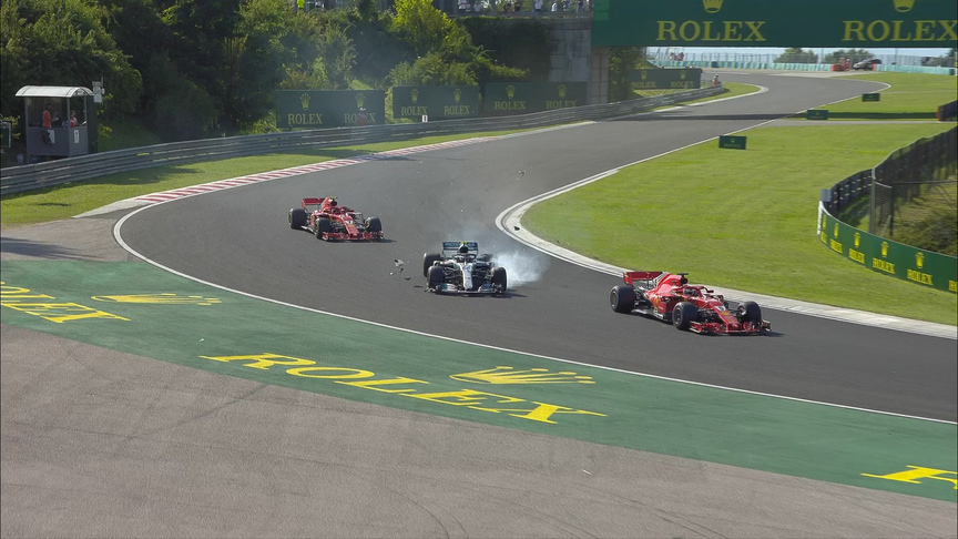 RACE: Vettel survives late-race clash with Bottas