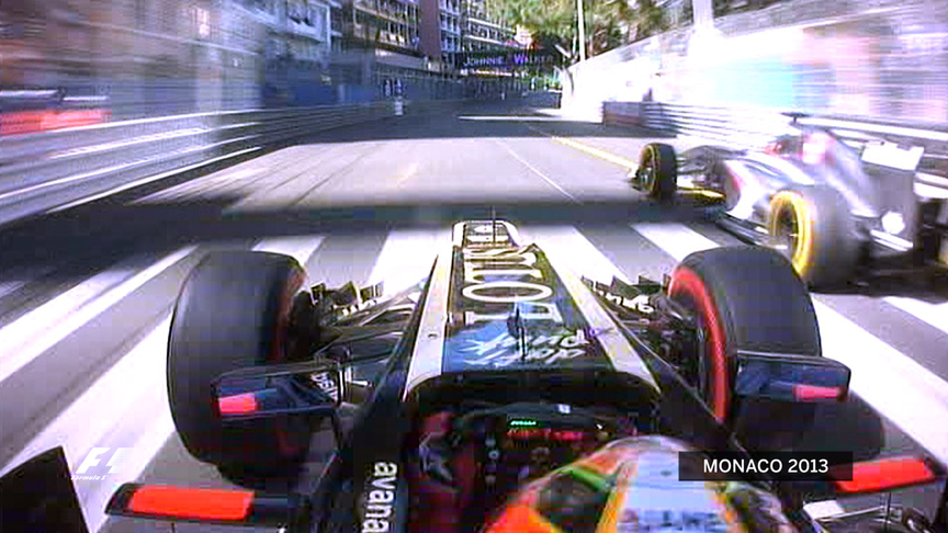 2013 -  Raikkonen passes Hulkenberg around the outside at Turn 1 on last lap