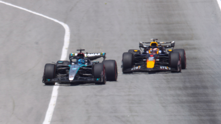 2024 Spanish Grand Prix: Verstappen goes round the outside of Russell at Turn 1 to take the lead