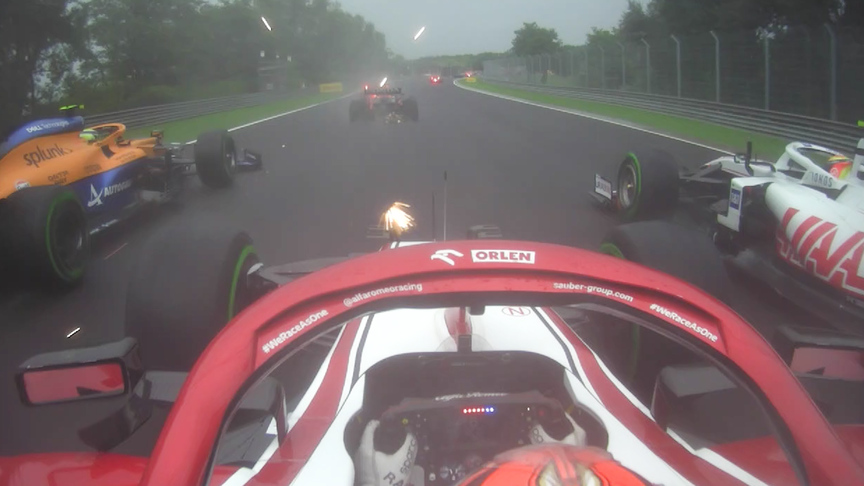 Awesome Raikkonen squeezes between two cars in daring Hungarian GP double pass