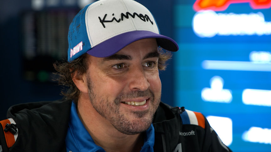 Fernando Alonso congratulates fellow double world champion Max Verstappen
