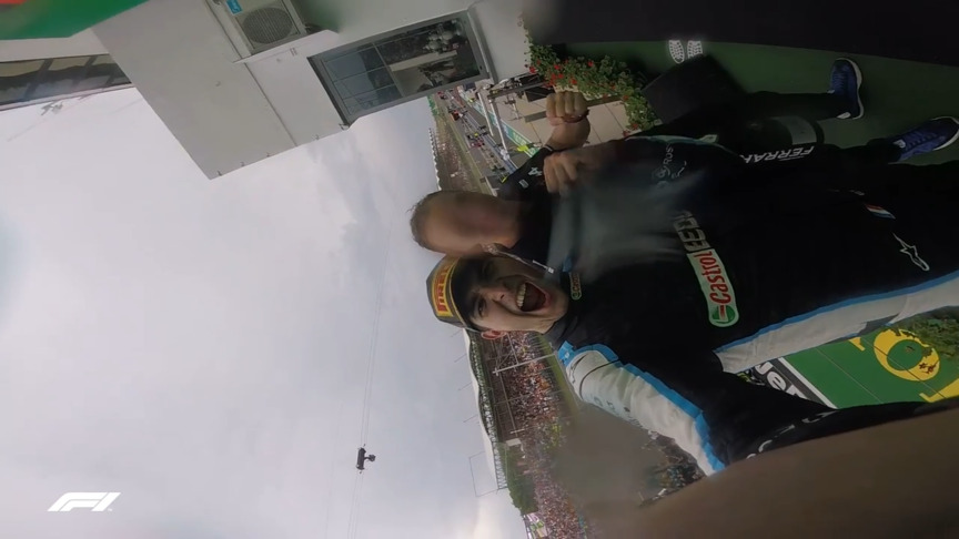 Esteban Ocon celebrates first F1 victory on podium with Ferrari Trento bottle camera