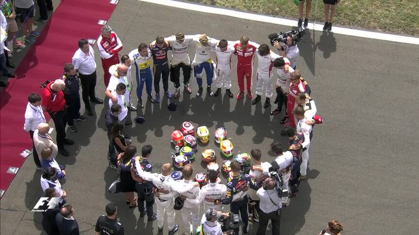 A minute silence for Jules Bianchi on the grid in Hungary