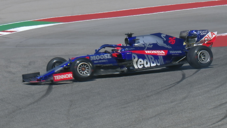 FP1: Kvyat ends up backwards as he exits Turn 1
