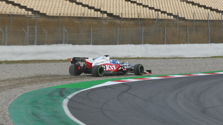Nicholas Latifi slithers through gravel in damp conditions