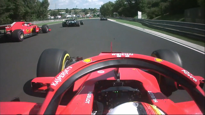 RACE: Vettel goes around outside of Raikkonen at start