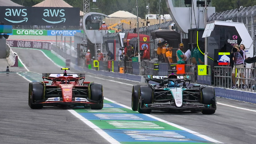 2024 Spanish Grand Prix: Sainz and Russell race for position in the pit lane